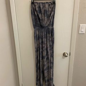 Tie dye romper. No belt included.